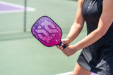 Maverick Pickleball Paddle pink in girls hands
