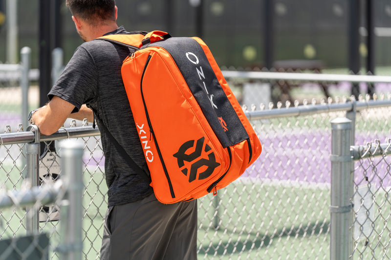 Pro Team Pickleball Paddle Bag lifestyle on man's back