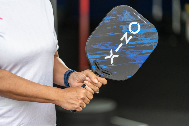 Malice DB Open Throat Pickleball Paddle in woman's hands